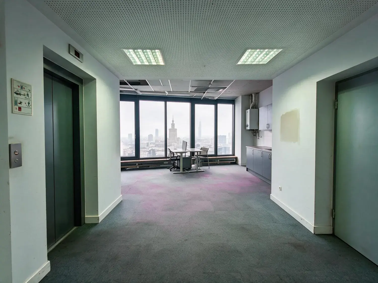 Before and after of a warsaw tower floor shot on a grey february afternoon with the windows blown out and the room three stops down — enhanced by Plotpane
