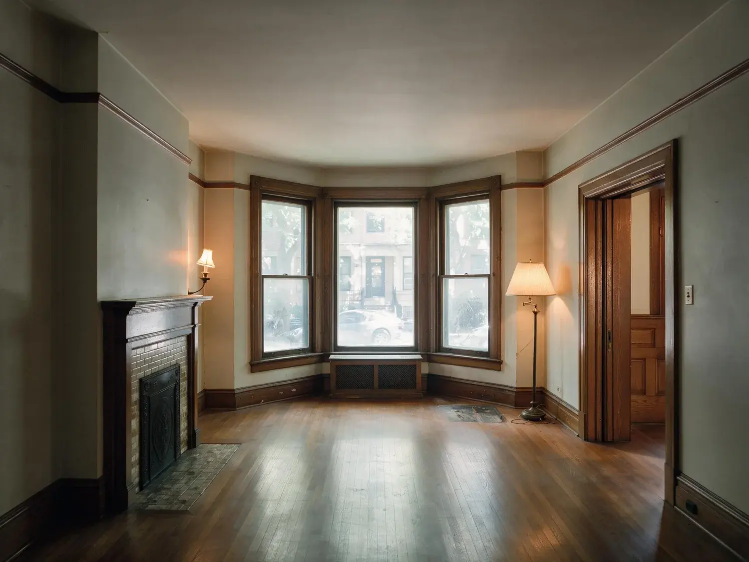 Before and after of a Lincoln Park greystone parlour, dark with the bay overexposed. — enhanced by Plotpane