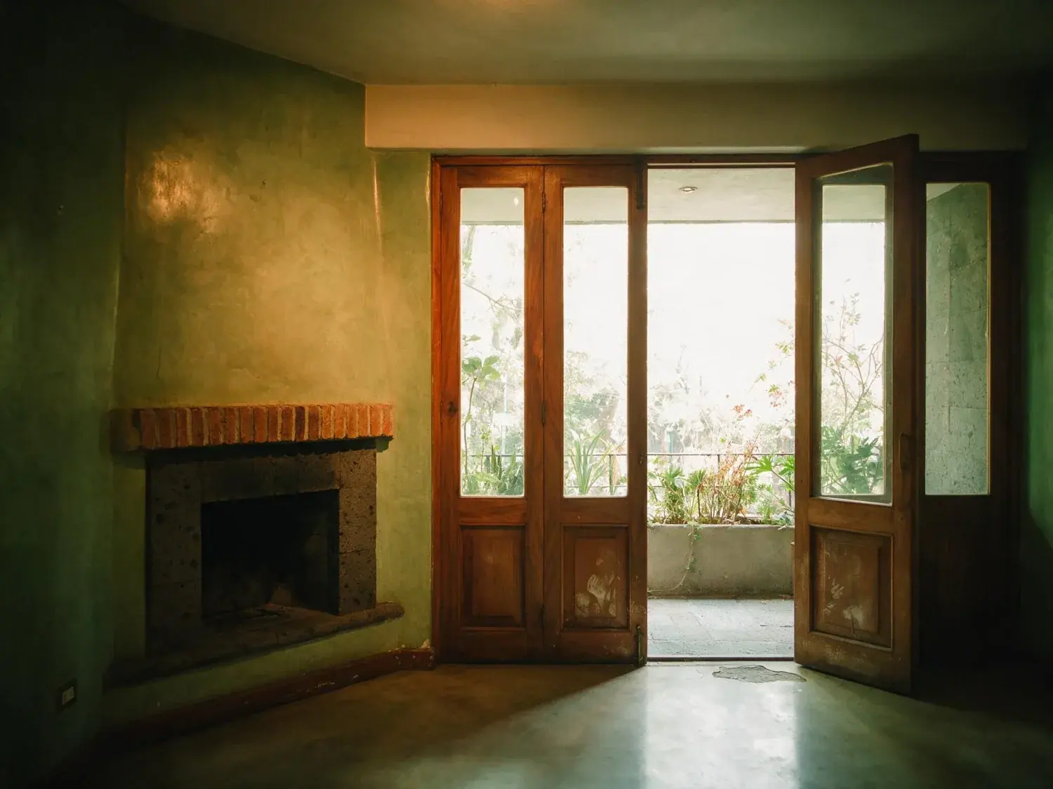Before and after of a Polanco apartment, dim with the terrace doors overexposed. — original listing photo before editing