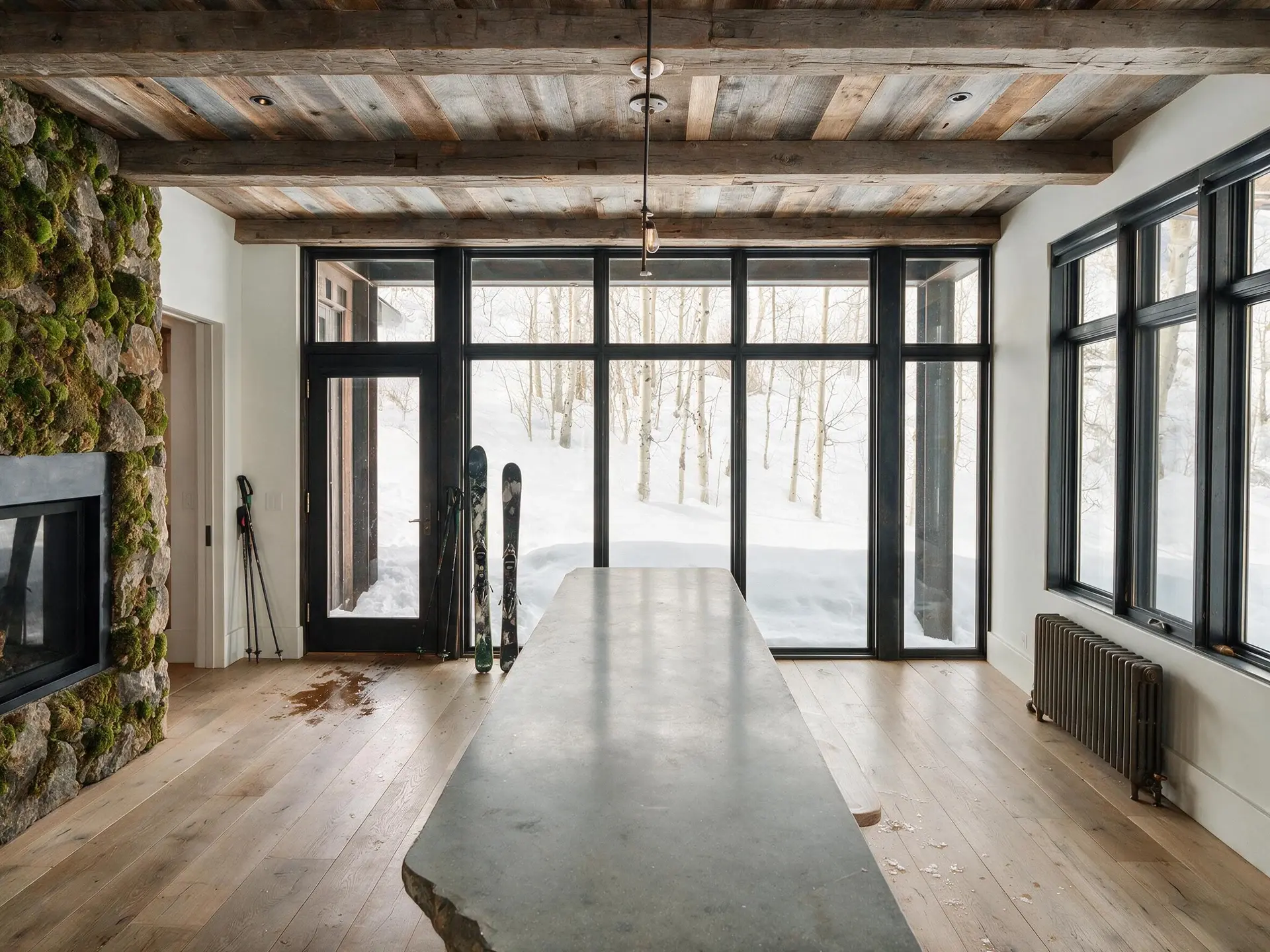 Before and after of a mountain house kitchen and great room in Aspen's West End with clutter removed. — enhanced by Plotpane