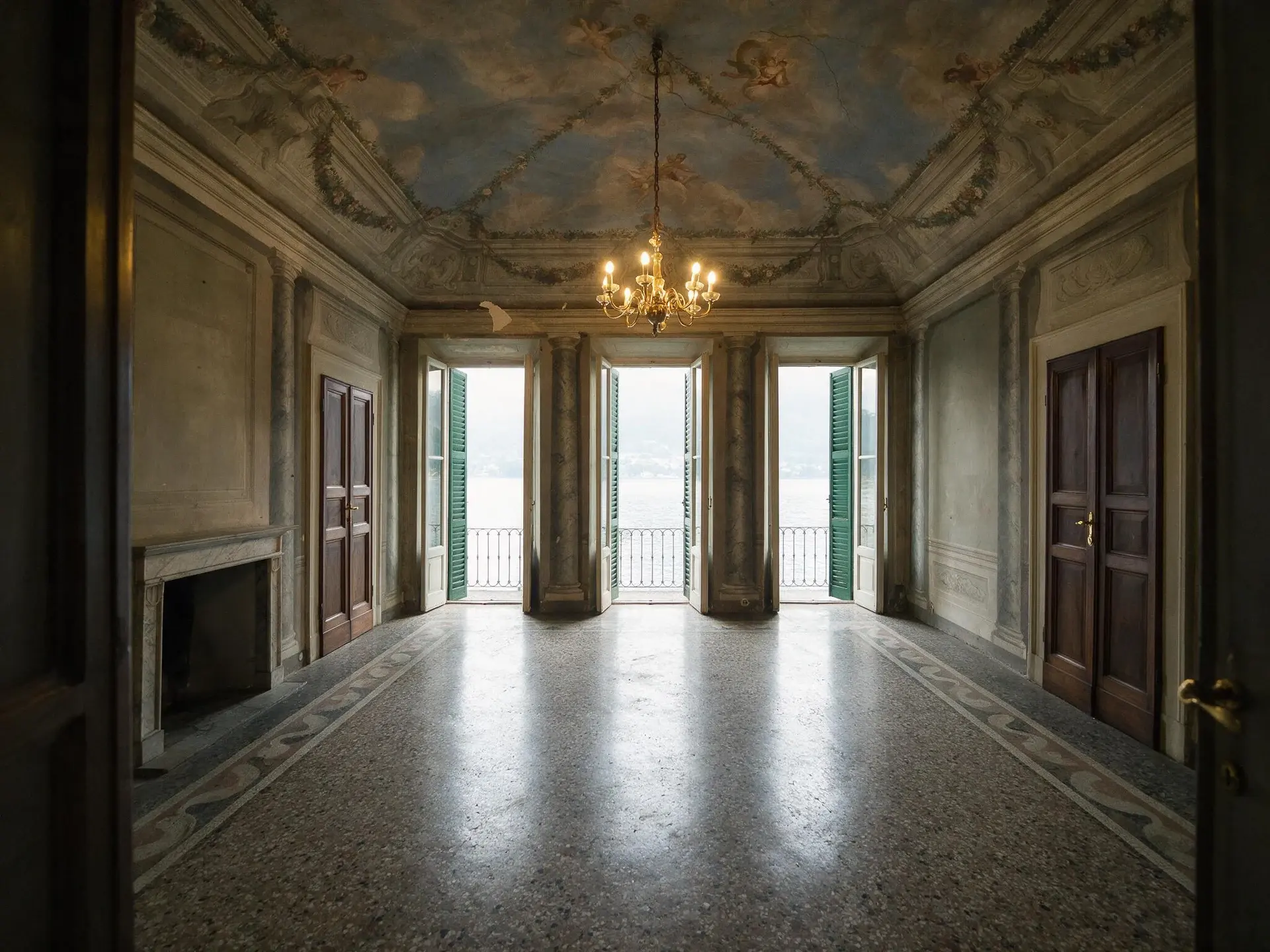 Before and after of a frescoed piano-nobile salon in Tremezzina, Lake Como, corrected for exposure and colour. — original listing photo before editing