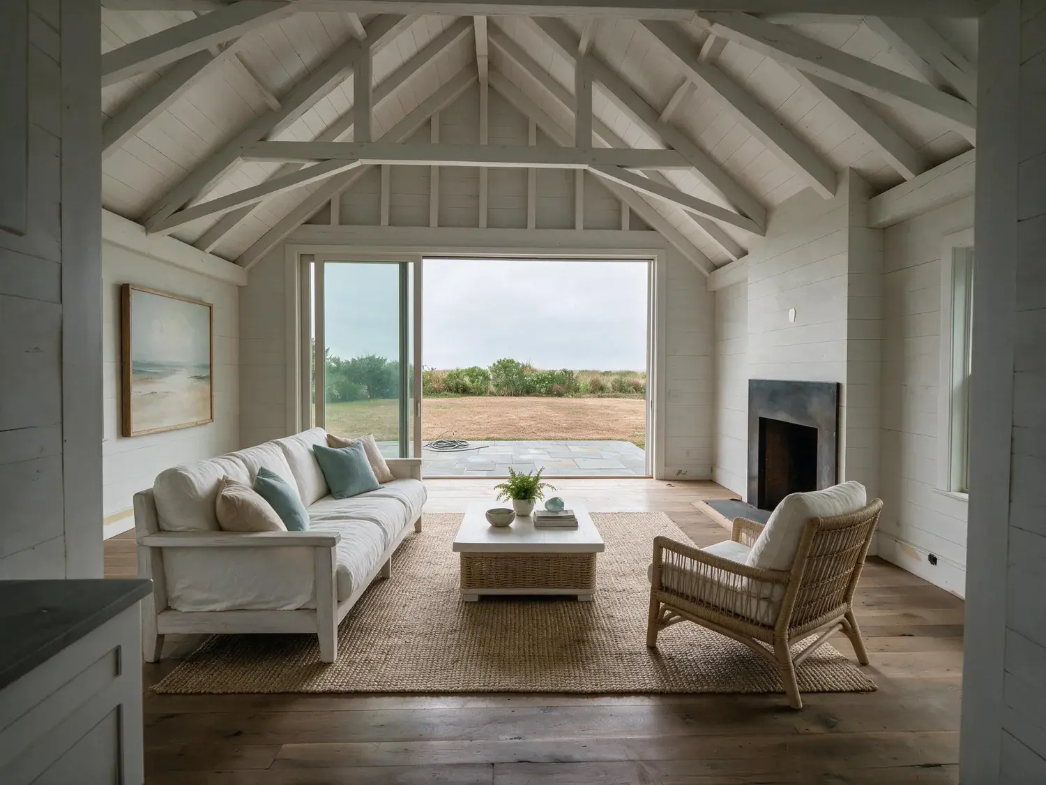 Before and after of a $12m bridgehampton modern-barn estate where virtual staging ai could stage the living room but couldn't fix the gray sky, brown lawn, or the hose coiled on the patio — enhanced by Plotpane