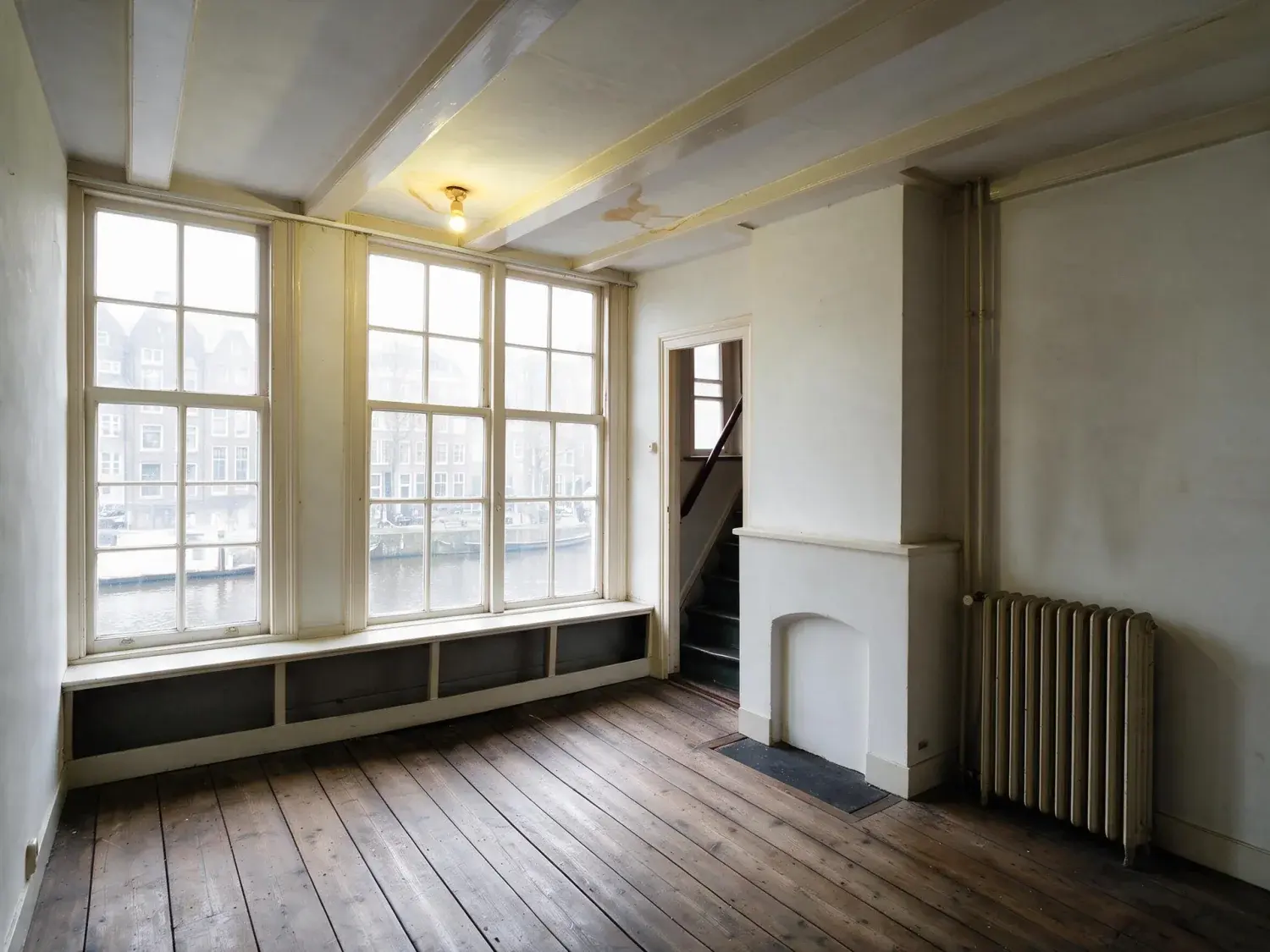 Before and after of an amsterdam canal-house front room shot into the light, so the windows are white and the room behind them is nearly black — enhanced by Plotpane