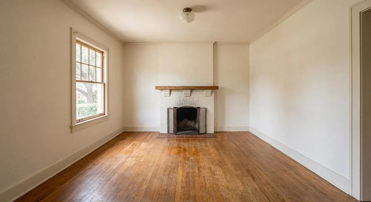 Same room, empty vs virtually staged — original listing photo before editing