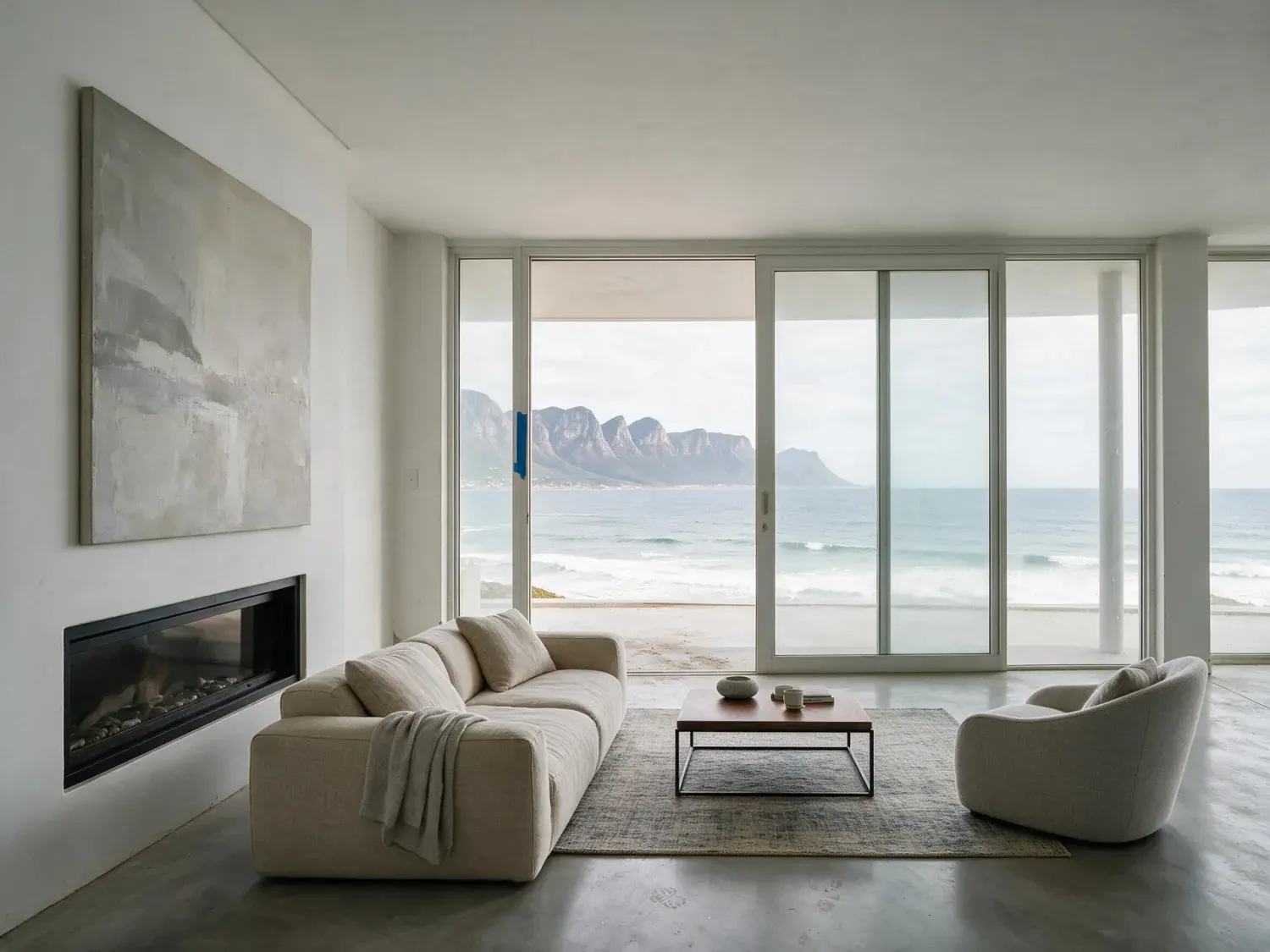 Before and after of an empty Clifton living room facing the Atlantic and the Twelve Apostles. — enhanced by Plotpane