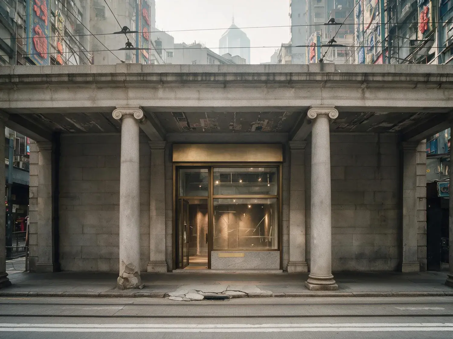 Before and after of a central hong kong boutique retail unit recovers its granite colonnade and colour-saturated signage backdrop from a flat, haze-dimmed street capture — enhanced by Plotpane