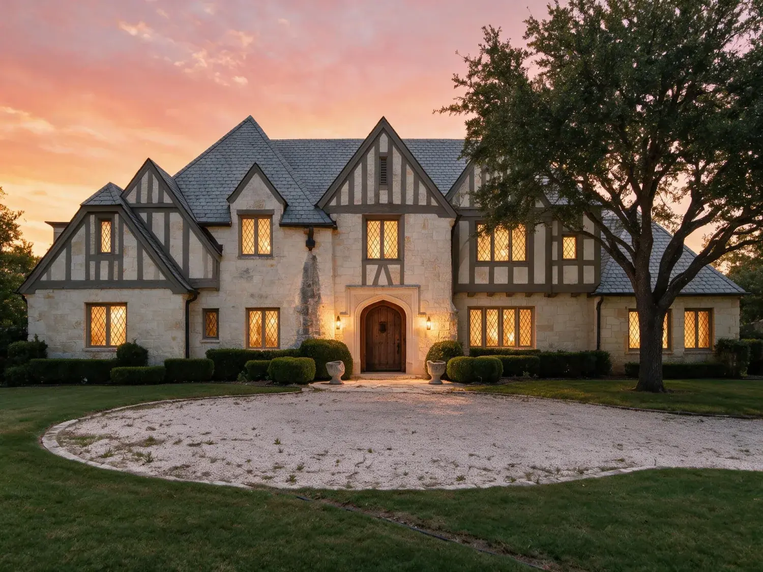 Before and after of front exterior of a highland park limestone-and-slate tudor estate converted from harsh midday to warm texas twilight — enhanced by Plotpane
