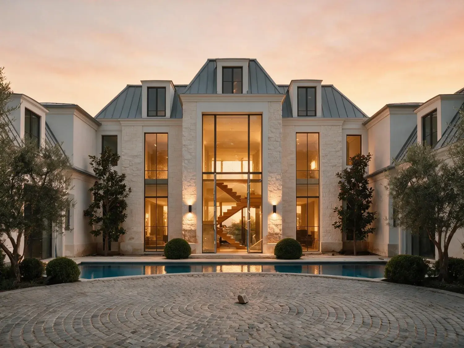 Before and after of a newly completed holmby hills spec estate tips from flat afternoon into a los angeles magic-hour portrait, landscape and lighting fully resolved — enhanced by Plotpane