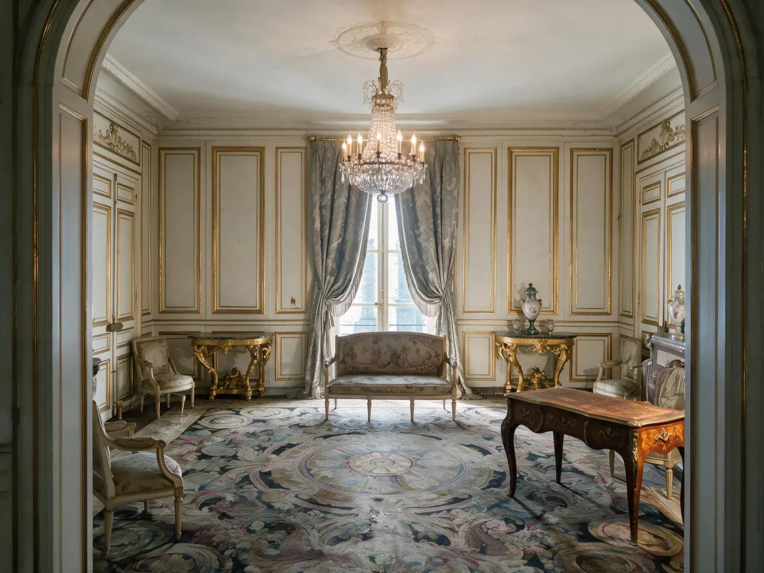 Before and after of the ritz paris suite impériale salon recovers its true gilded warmth — chandelier crystal, silk damask and savonnerie carpet — without losing its old-world restraint — enhanced by Plotpane