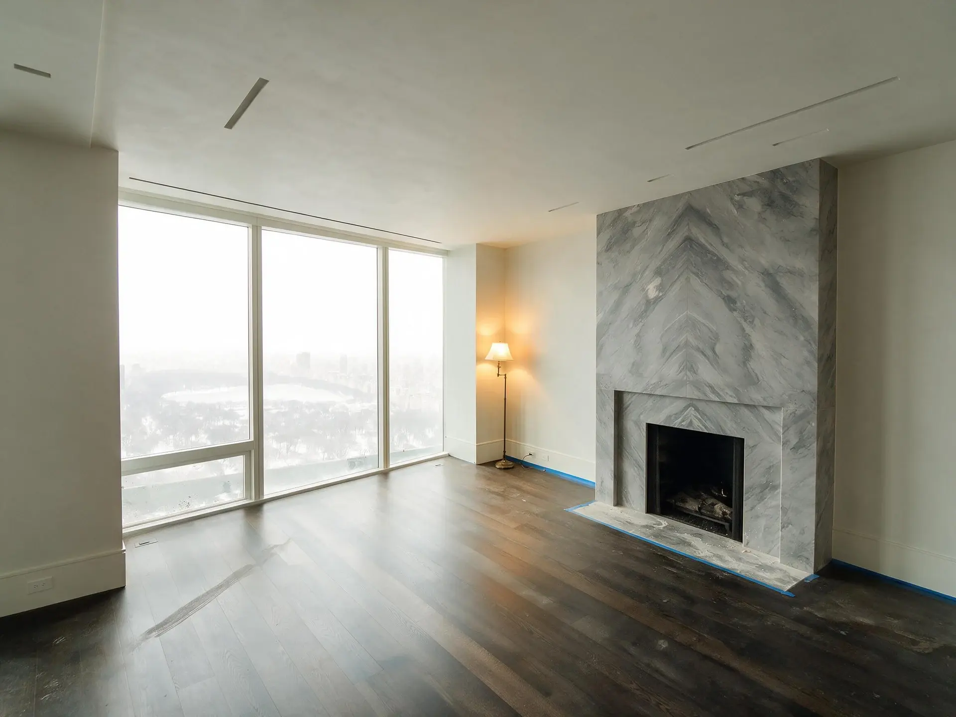 Before and after of a Billionaires' Row penthouse great room in New York facing Central Park — enhanced by Plotpane