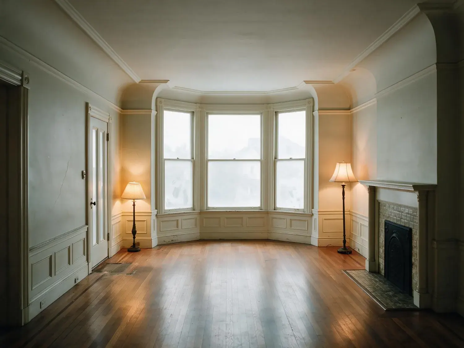 Before and after of a Pacific Heights Edwardian, dim with the bay window burnt out. — enhanced by Plotpane