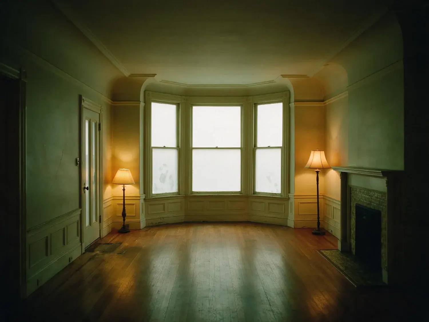 Before and after of a Pacific Heights Edwardian, dim with the bay window burnt out. — original listing photo before editing