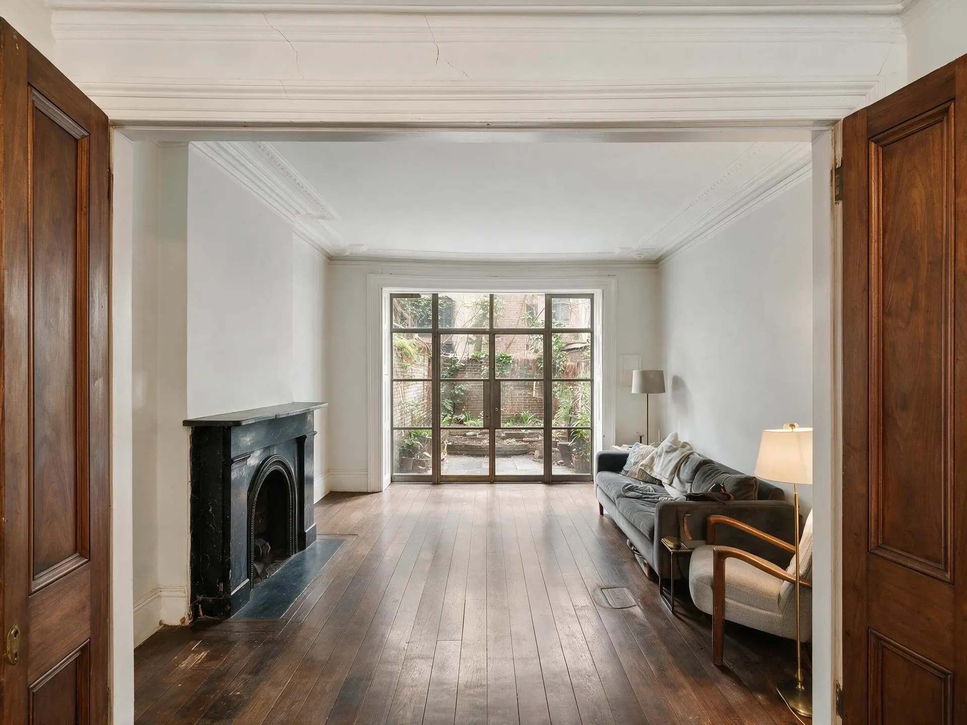 Before and after of a West Village townhouse parlor in New York with owner clutter removed — enhanced by Plotpane