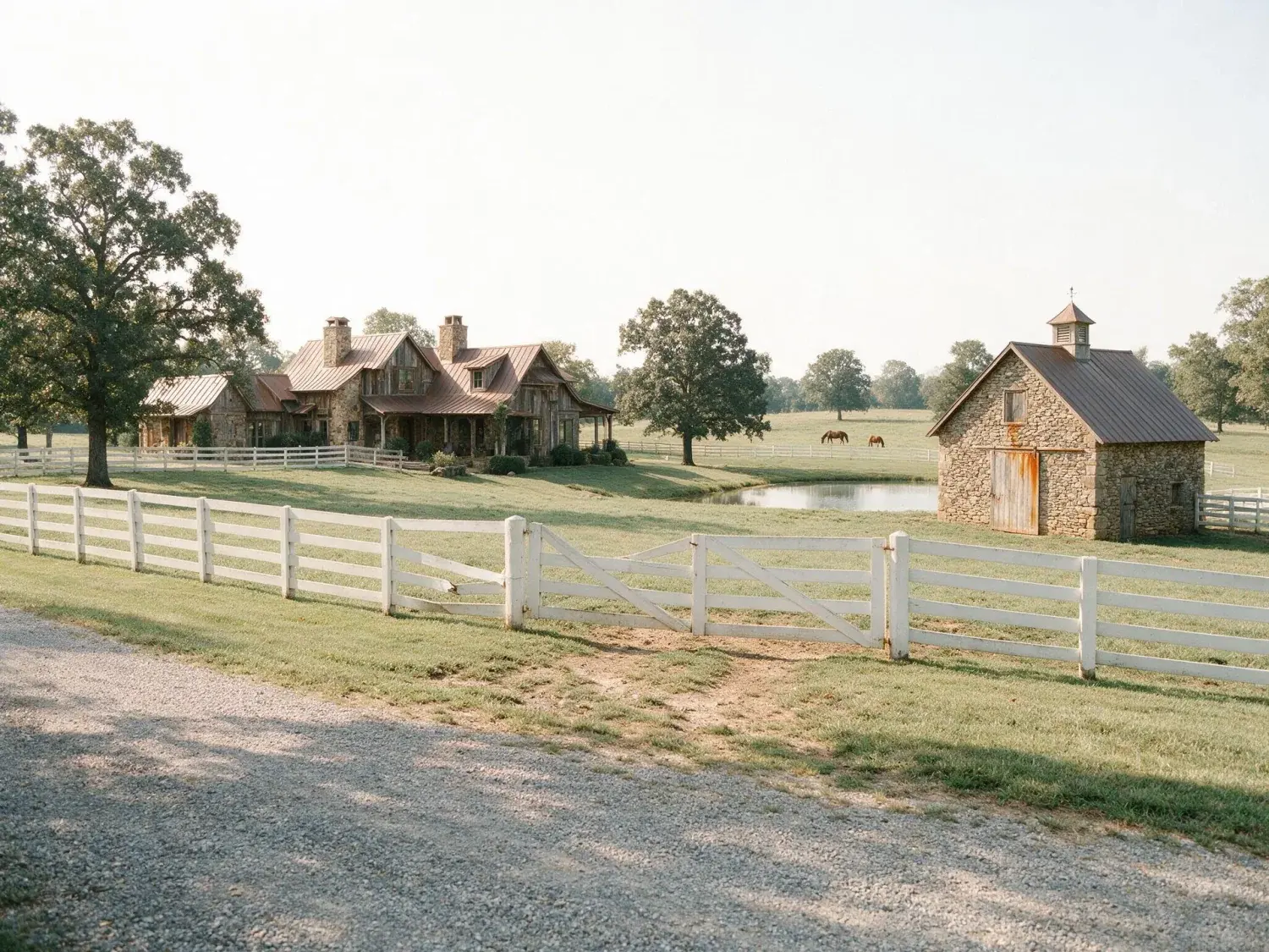 Before and after of a leiper's fork tennessee horse-country estate — rolling pasture, stone barn, bluestone springhouse — lifted from a flat phone shot into a sotheby's-register editorial hero — original listing photo before editing